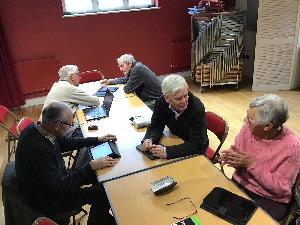 Members of the group engrossed in serious discussion